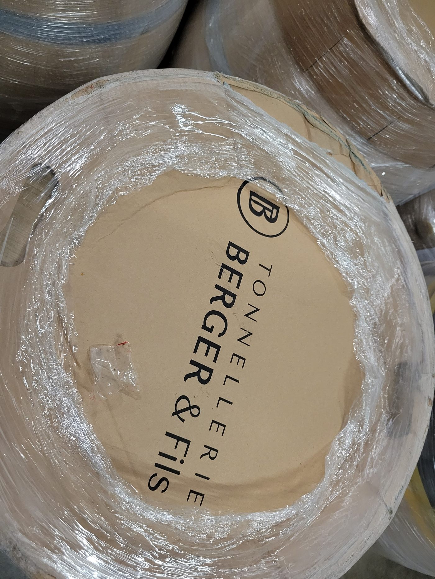 Head of a new French oak barrel stamped by the cooper